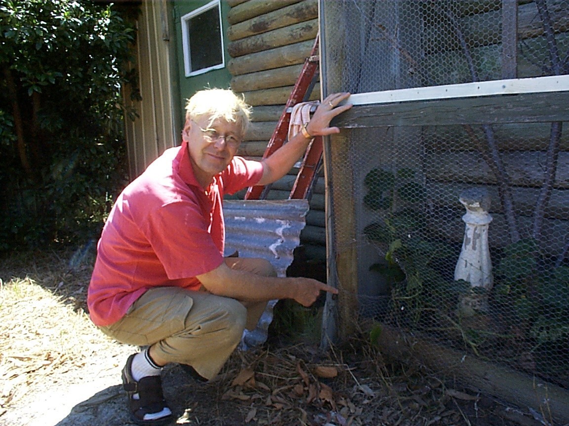 Antonio at his bird cage